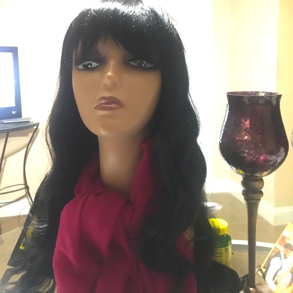 Studio Cut style wig.  Wig is a body wave .